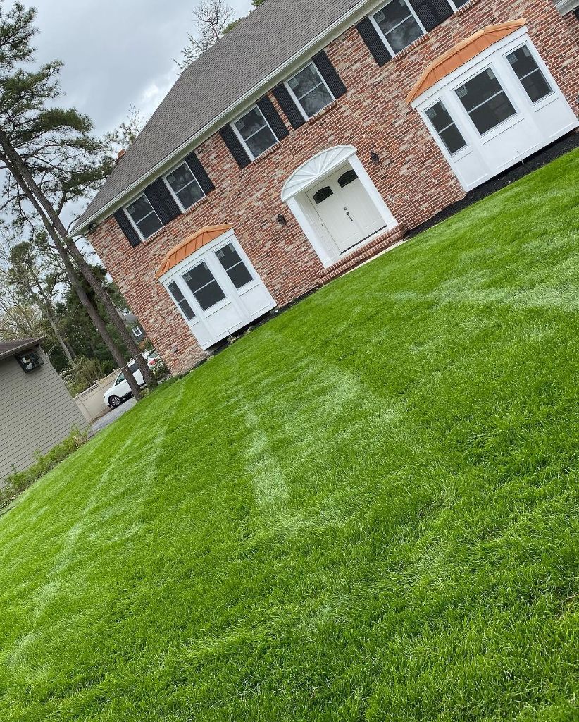 Professional lawn mowing and maintenance — lush green lawn South Jersey